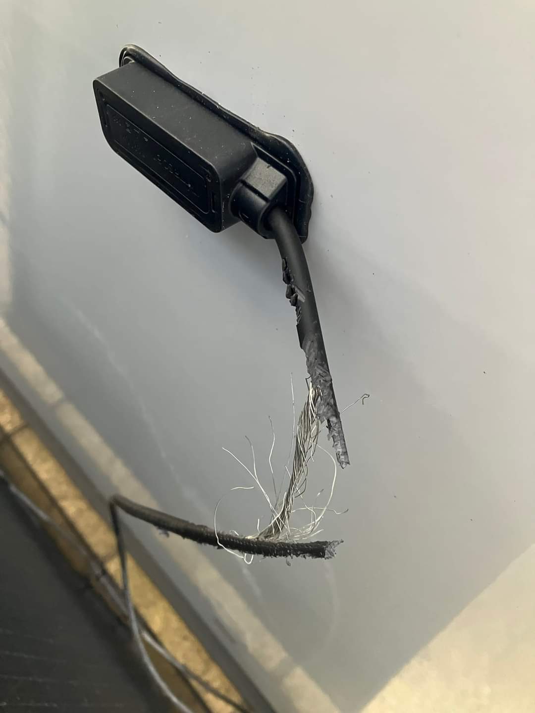 Damaged solar cable identified during electrical fault-finding and rectification work in Devon